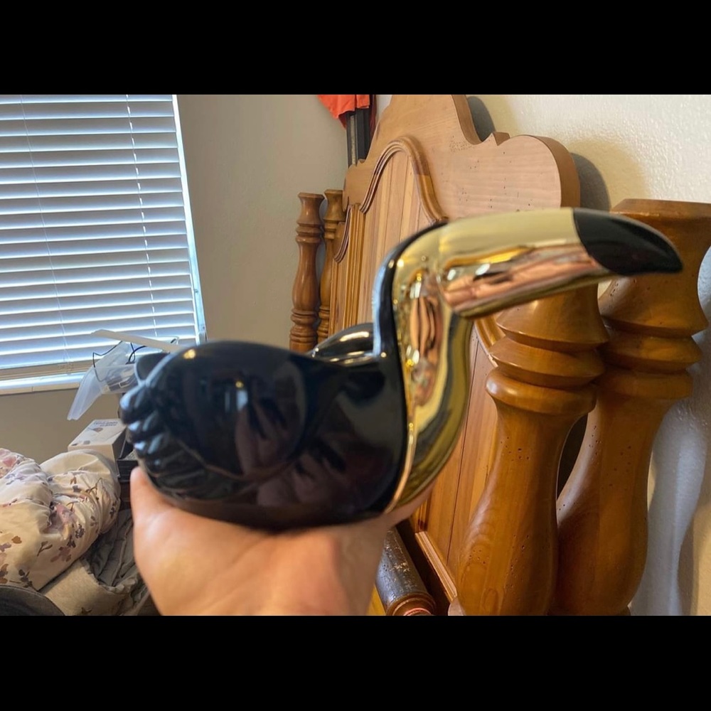 Toucan candle holder